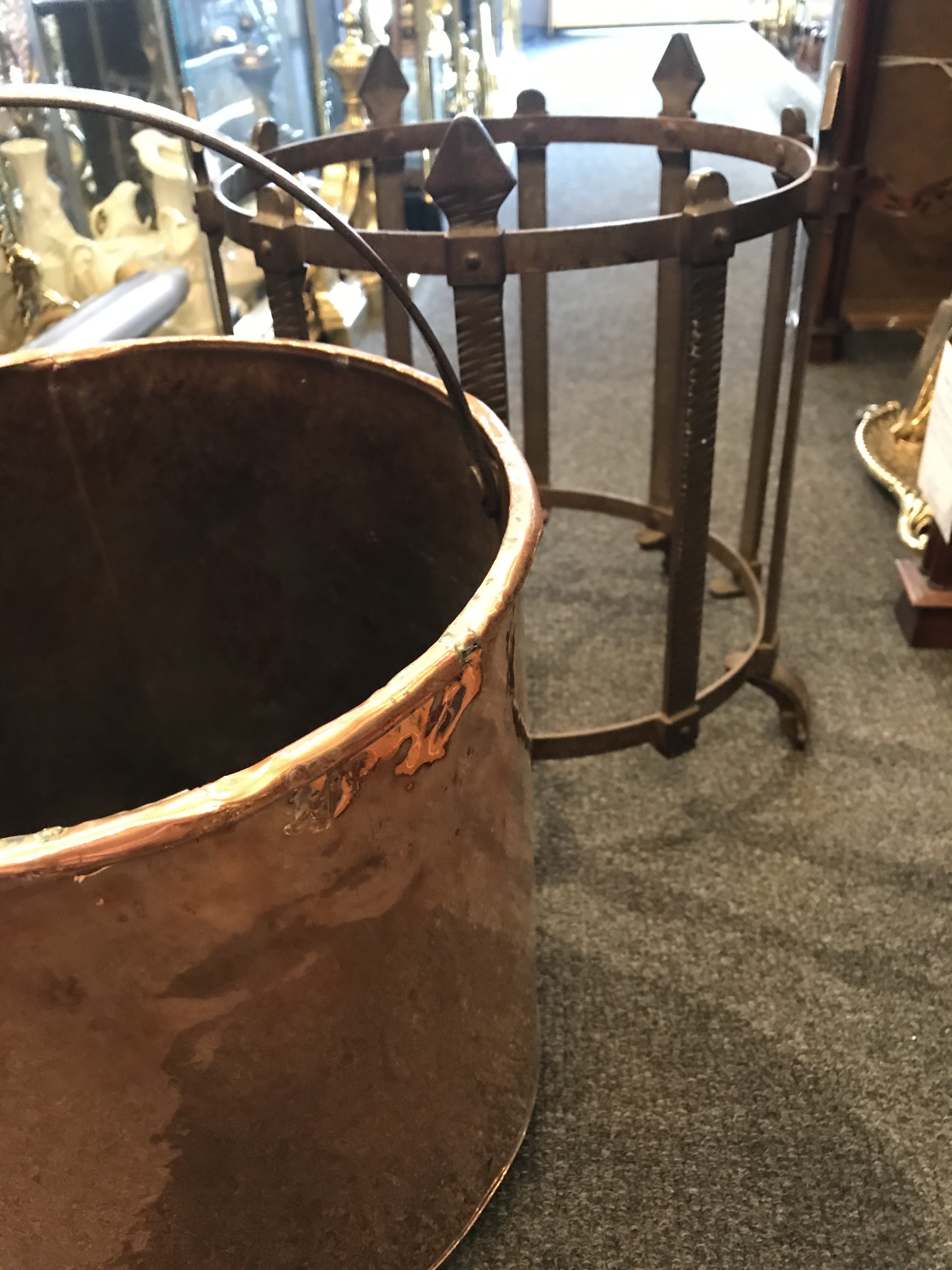 This is a superb quality Arts & Crafts copper t coal scuttle which is a very top quality piece is a very unusual shape, it is in style the same as most enclosed coal scuttles.