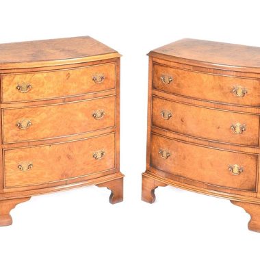 'PAIR OF WALNUT BOW FRONT CHEST'