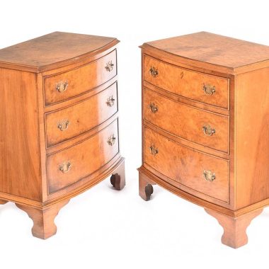 'PAIR OF WALNUT BOW FRONT CHEST'