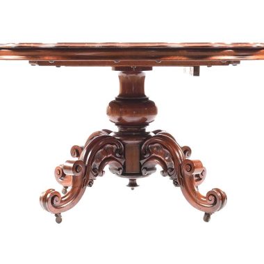 Description:VERY FINE VICTORIAN SHAPED TOP MAHOGANY CENTRE TABLE WITH TURNED COLUMN. RAISED ON FOUR SCROLLED CARVED LEGS WITH CASTORS.